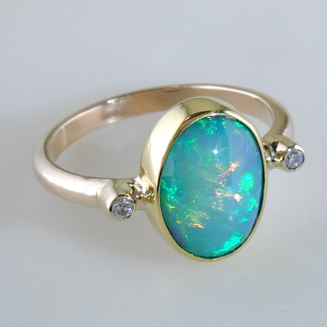 Ethiopian Opal Harlequin Oval Gold Ring